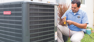 SunVena HVAC tech repairing AC in Oviedo, FL